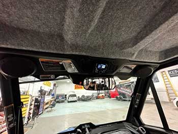 Brand new Can Am Defender needed a full audio add-on.  Custom designed system to house Rockford Fosgate digital receiver & coaxials in front and rear. Custom built ported enclosure for Kenwood sub. All powered by Rockford amp.