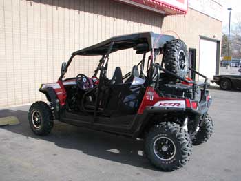 2010 Polaris Razor. It Has a pair of Boss tower speakers mounted on the roll bar and a Clarion Digital Marine Display Head Unit with a Water Tight Hideaway Command Source