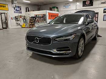 2017 Volvo S90. We custom built an enclosure to house a Kenwood Excelon 10 sub keeping the trunk functional and OEM looking. Also installed an Audio Control output converter and an Rockford Fosgate amplifier.