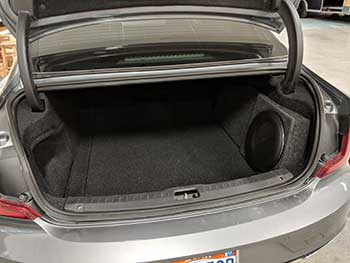 2017 Volvo S90. We custom built an enclosure to house a Kenwood Excelon 10 sub keeping the trunk functional and OEM looking. Also installed an Audio Control output converter and an Rockford Fosgate amplifier.