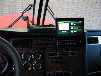 2005 Kenworth Semi - Installed a Clarion single din flip out with bluetooth/ USB / Navigation / DVD / Satilite Radio / , a 2000 watt power converter and installed a flat screen TV and a micro wave and a Fridge.