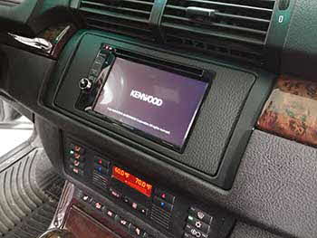 2004 BMW X5. This model had an OEM navigation indash and there is no aftermarket kit so we fabricated our own kit to house a Kenwood 6.2" entertainment receiver.
