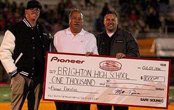 with Pioneer at Brighton High School where we donated 1000.00 to their Football and dance program.
