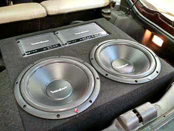 95 Mitsubish 3000GT - Installed system with basic custom subwoofer enclosure that incorporated the amps. Kenwood receiver, Focal 5 1/4" speakers up front, Kenwood 6x9's in the rear. Rockford 12" subs, 2 Rockford amps.