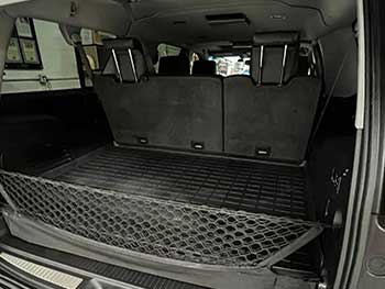 2015 GMC Denali. Did a full Kenwood Excelon system. 2 power amps, 1 mono amp, woofer and shallow mount speakers. Vehicle came with floor cargo compartment that we replaced with a custom designed sub and amp compartment. It was designed to also allow cargo to be stowed normally in the compartment.