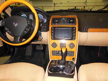 2007 Maserati. Replaced the Maserati factory head unit with Kenwood components: factory integration unit, 7" touchscreen indash monitor, add on navigation & blue tooth, CD/DVD player and custom built the dash unit & a custom built trunk enclosure. Also installed a Crimestopper back-up camera.