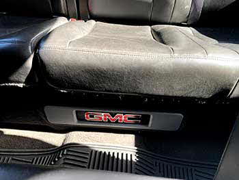 2012 GMC Sierra truck. We custom built enclosure for 2 Kenwood 12" subwoofers and mounted under rear seats.