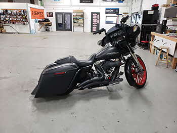 Harley Street Glide came in to have us cut in & add rear speakers in the bag lids. We cut/wired/installed the rears in the bag lids with the Rockford Fosgate kit (6X9 speakers) and also flashed the bikes stick deck to a flat eq curve for better tunability & lower distortion.