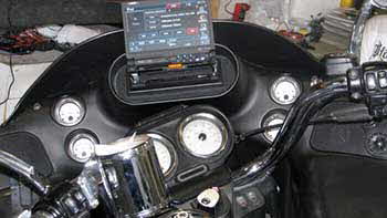 Harley Davidson - Installed in the cowling Kenwood 6.95" Big Screen Flip Out AM/FM/CD/DVD w/Added on Nav, Bluetooth & Sirius. Rockford Fosgate small sized amp and 2 pair Kenwood Excelon 5.25" Speakers.