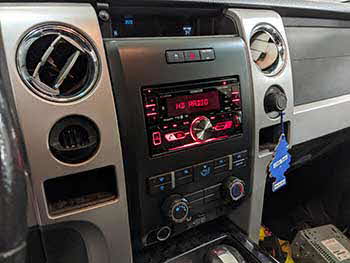 K-BULL93's 2011 Ford F150. We installed a Kenwood deck, Rockford Fosgate tower speakers mounted on rear shell and a Rockford Fosgate amplifier.