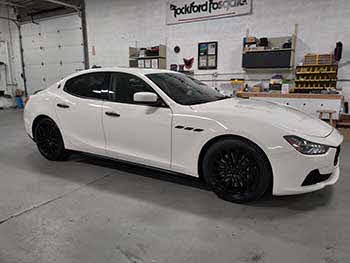 2015 Maserati Ghibli. Custom installed Escort radar detector with stealth installation of 4 shifters and mute switch plus custom integrated rear view mirror system. Custom installed Hertz-Audison direct cockpit sound system consisting all active DSP controlled amps, subs and components with complete MESA mat sound damping.