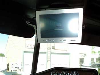 '96 Freightliner. Installed Kenwood Bluetooth HD receiver with flush mounted USB port and 10" touch screen to control laptop in work station sleeper. Clarion 4-channel amp with Planet Audio 10" sub woofers in ported box under sleeper. 