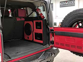 2018 Jeep Wrangler JK make over using Kenwood, Rockford Fosgate, Viper, Escort and MESA equipment. Custom fabricated enclosures for amps and subwoofers.