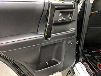 2019 Toyota 4 Runner. This was a SQ (Sound Quality) System. We kept the OEM head unit and all of its functions. We used Rockford Fosgate processor & Maestro smart harness, two pair Rockford T5 components and two 10" Rockford subs in a custom built enclosure. Powering the system are Rockford amps. All four doors and some of the cargo area were treated with MESA mat sound damping.